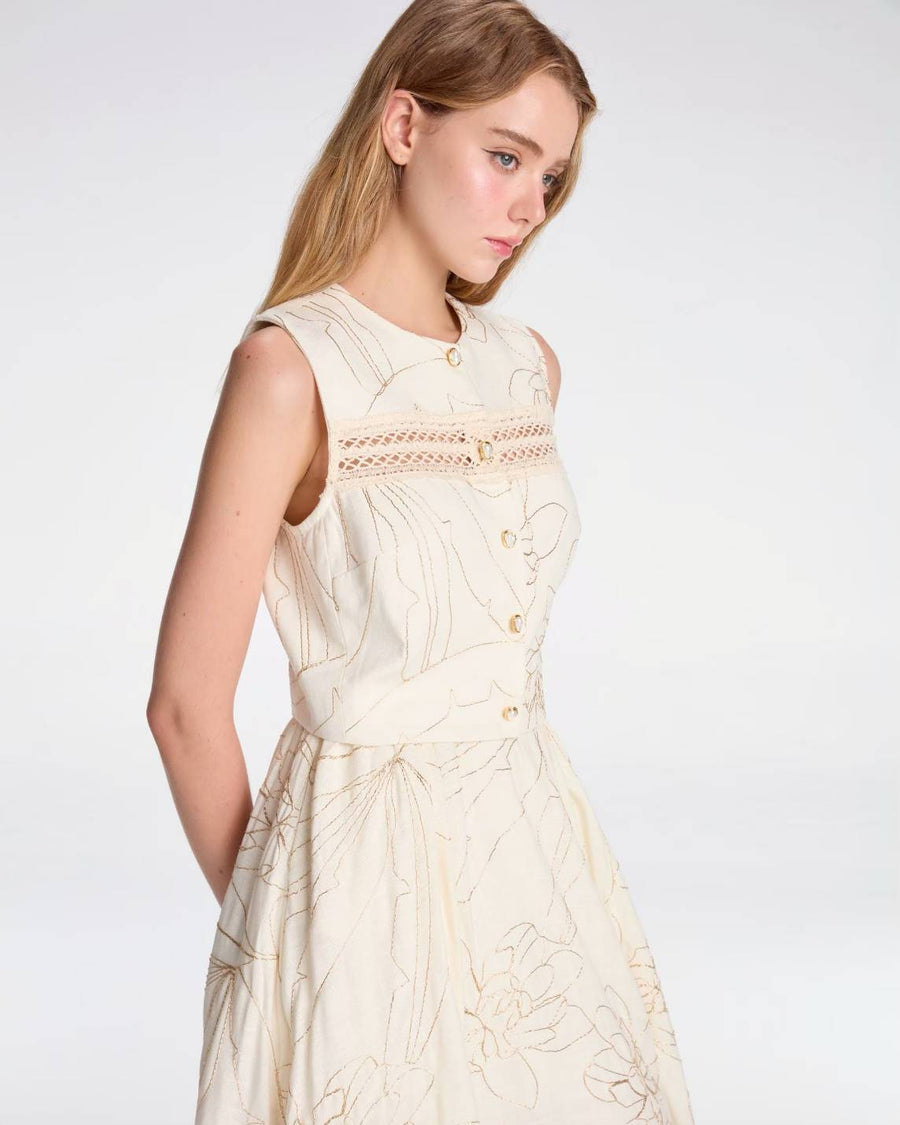 Sleeveless crop top with gold embroidery