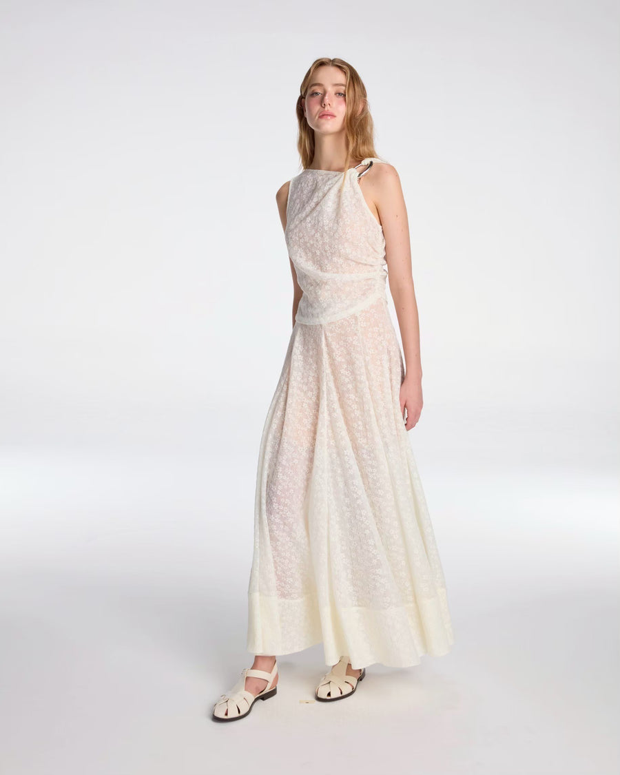 Draped top tied with metallic ornament