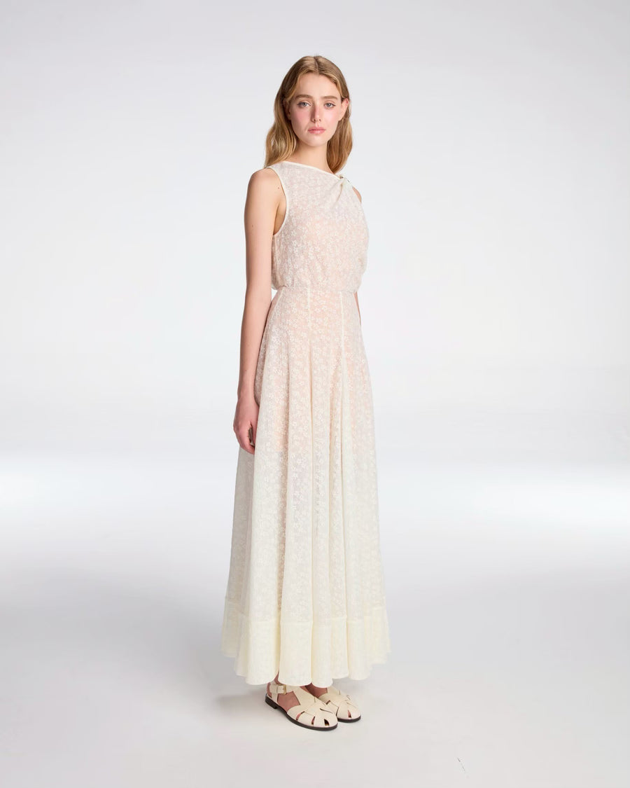 Draped top tied with metallic ornament